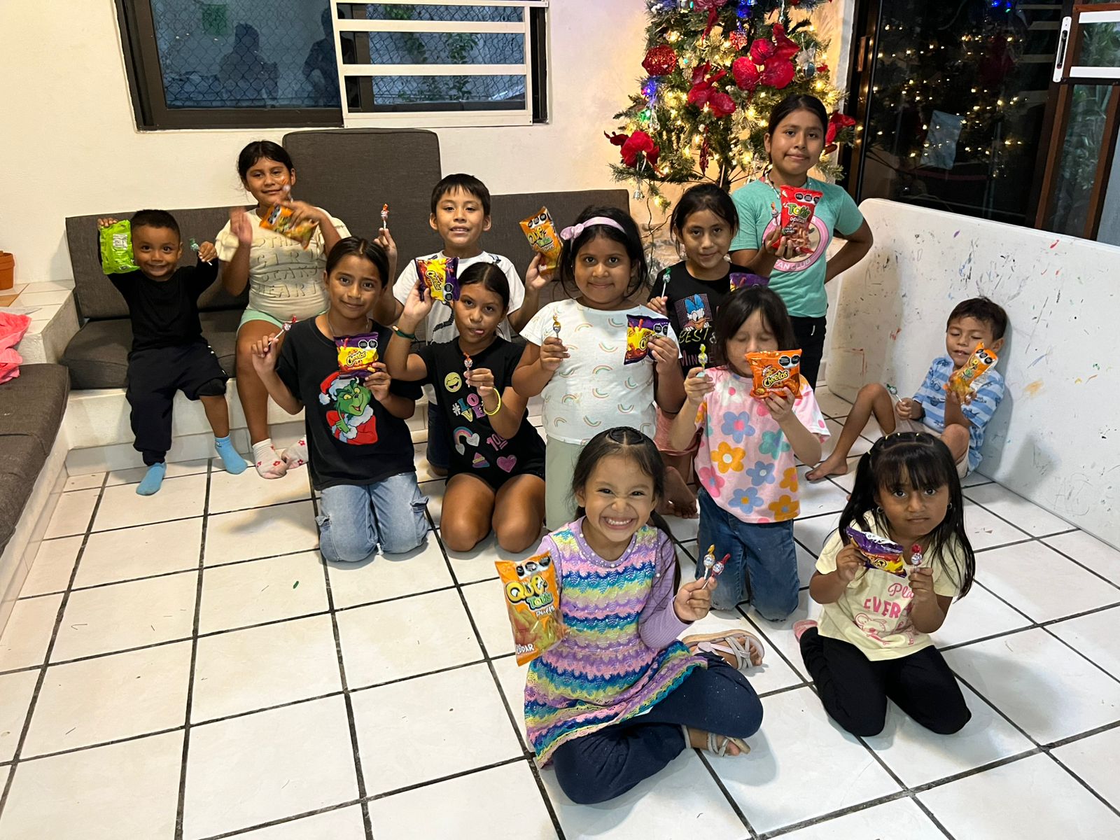 Children receiving snacks during a holiday outreach