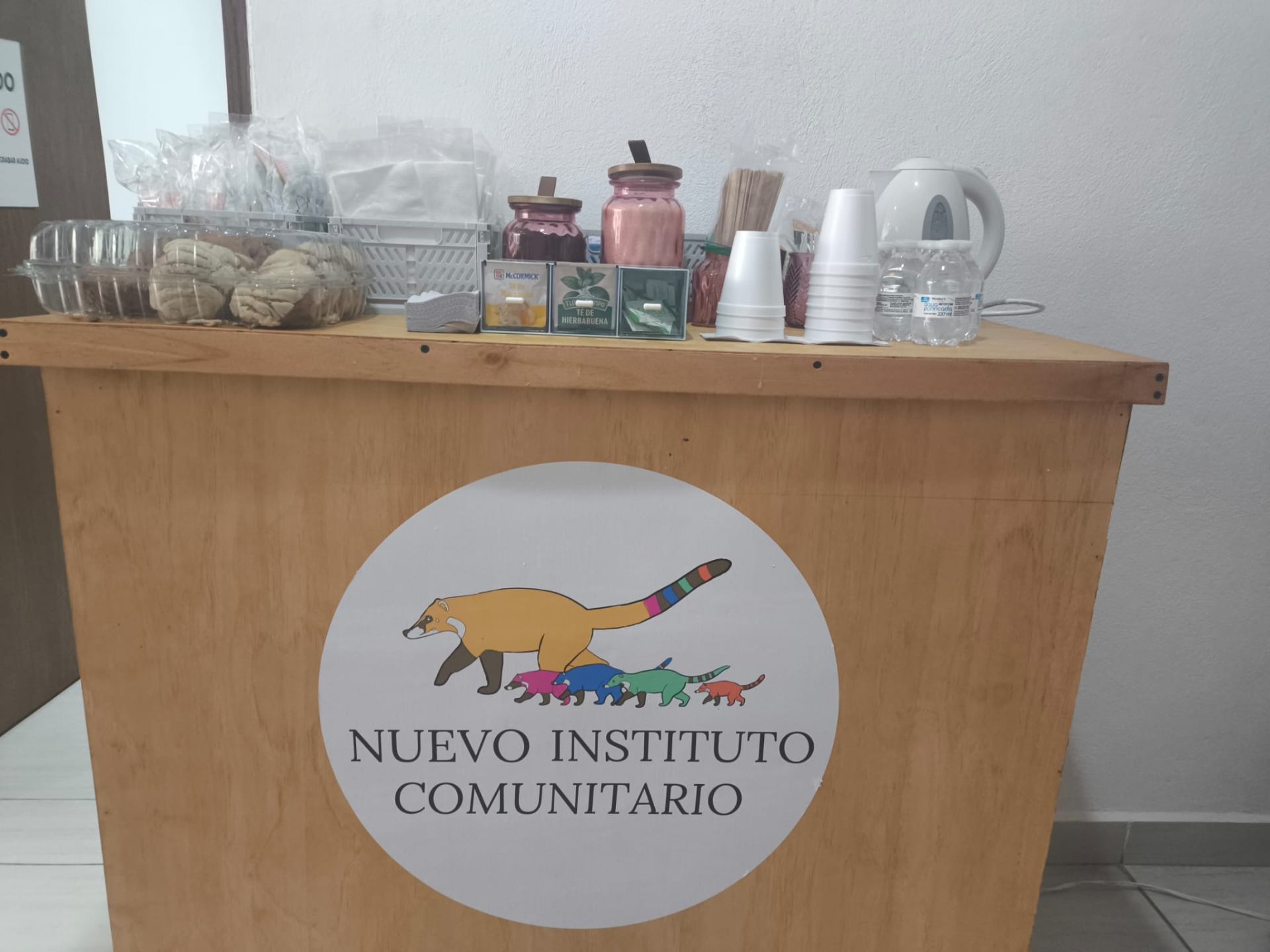 Supply cart with cookies, water and tea